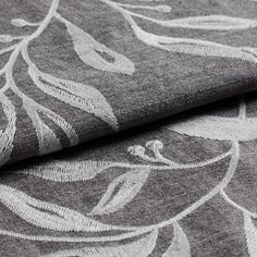 Folded swatch photography of a Seraphina Slate Roman Blind