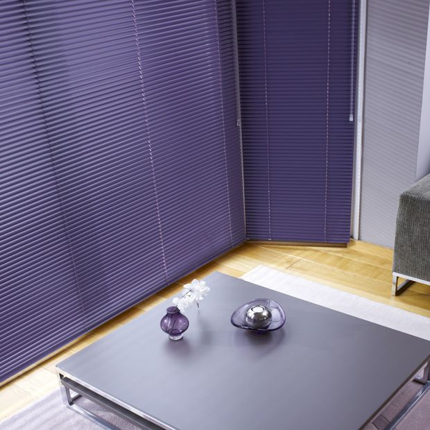 Living room with venetian blinds in a beautiful purple damson colour