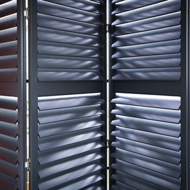 Clay tracked shutters in kitchen