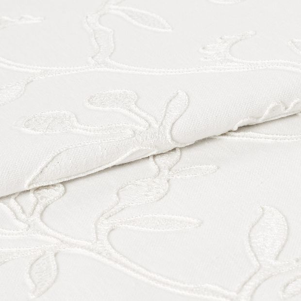 White coloured fabric of Adhara Whisper with detailed stem design woven into the material