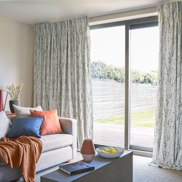 Amerlia Clay curtains on sliding doors in contemporary living room