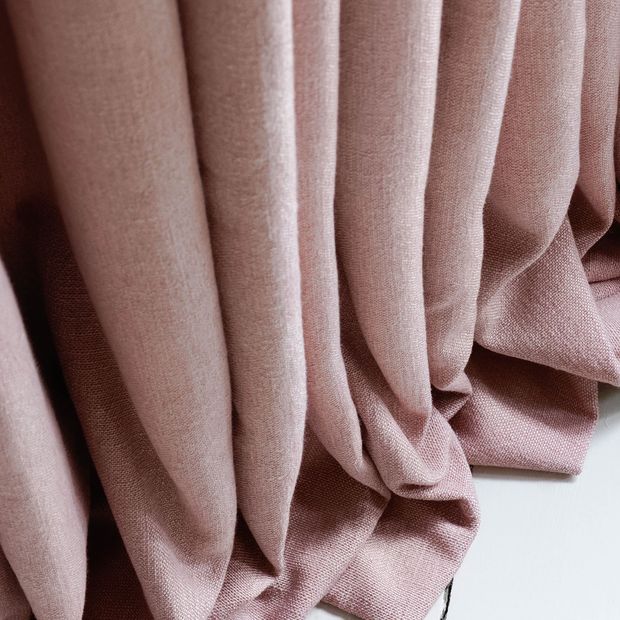 Close up of Bailey Taffy curtains pooling on the floor