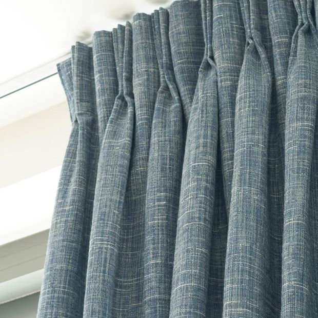 Close up detail of triple pinch pleat header style on Haddie Ocean curtains