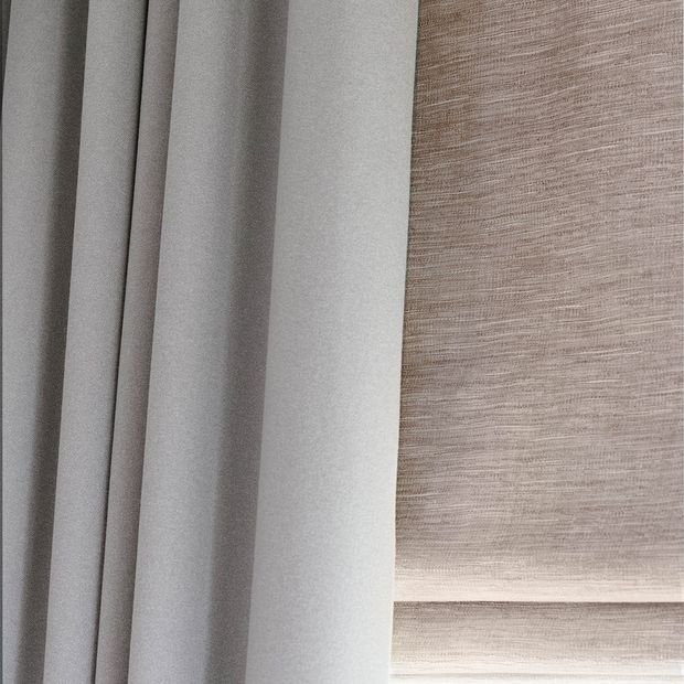 Close up of Huxley Dove Grey curtains Haddie Chalk Pink romans in living room