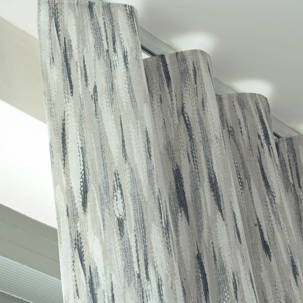 Close up detail of Impression Smoke curtains with a wave header style