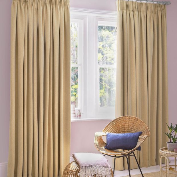 Kendra Maize curtains at wide window in bedroom