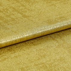 Yellow coloured fabric with darker yellow highlights that repeat across the material creating a textured look