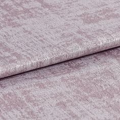 Folded fabric in a shimmering and textured purple colour