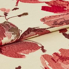 Floral designs in red with dark hand woven shades for a watercolour like style on cream coloured material