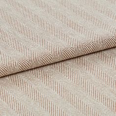 The neutrally styled Kendra Woodrose fabric folded