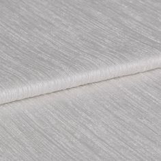 Shimmering grey coloured material with darker grey highlights for a textured appearance