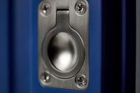 Close up image of a flush ring pull fixed to a solid shutter