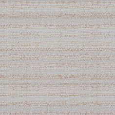 Franco Apricot swatch is an off white background with tiny grey and mid-orange squares forming horizontal tracks
