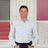 George Clarke stood in front of different venetian and vertical blinds
