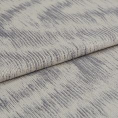 Grey and cream textured pattern of Tranquil Ash folded over