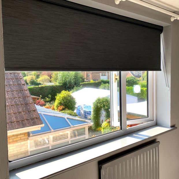 Hayden Graphite Roller blinds in a white room