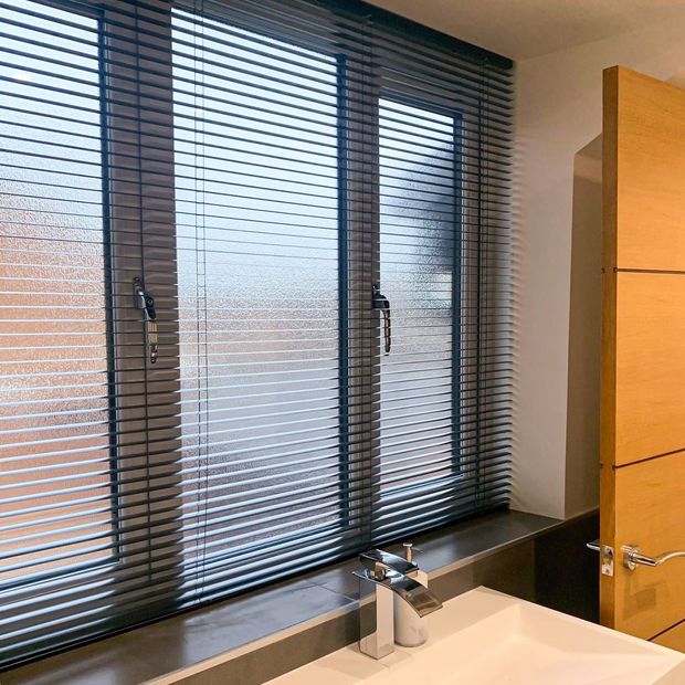 spectrum charcoal grey metal venetian blinds in bathroom