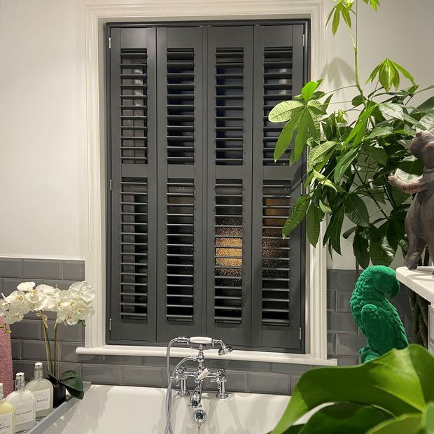 Clay shutters in bathroom