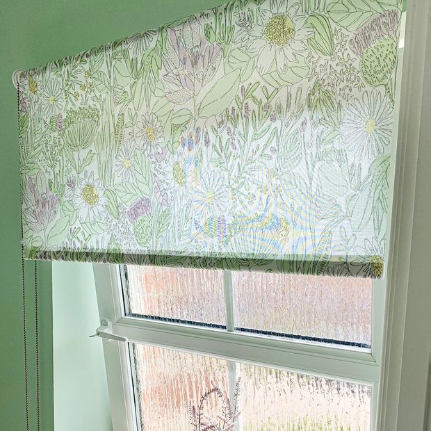 Daisy spring roller blind on bathroom window