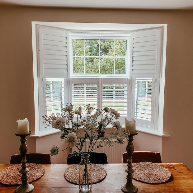 Extra white shutter in dining room