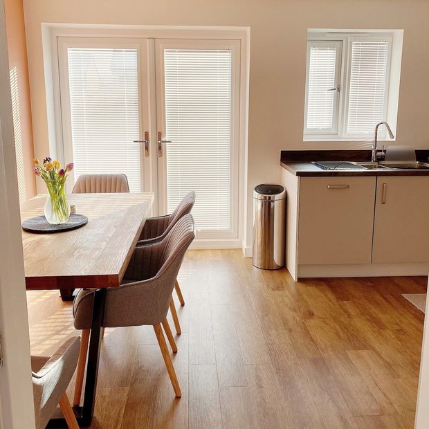 Portfolio white perfect fit venetian blinds in kitchen and dining room