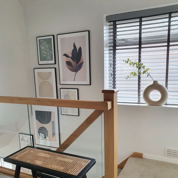 Ellwood iron grey wooden blinds in stairway with wooden accents