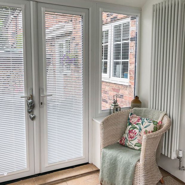 Special finish glacier venetian blinds on conservatory door