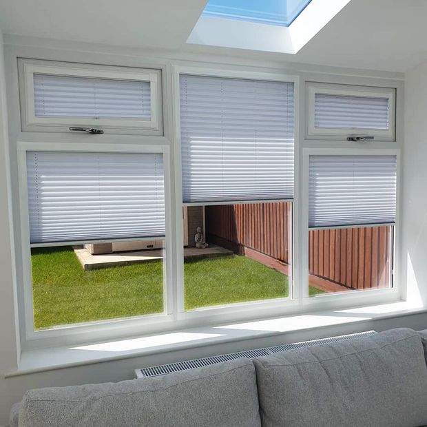 Crush Silver Grey pleated blinds in living room window
