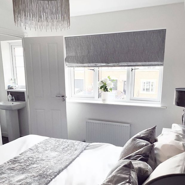 Daze silver roman blind in silver themed bedroom