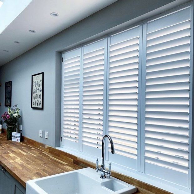 Aura white shutters in kitchen