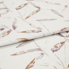 A folded piece of fabric with Aloha Blush Orange printed on it