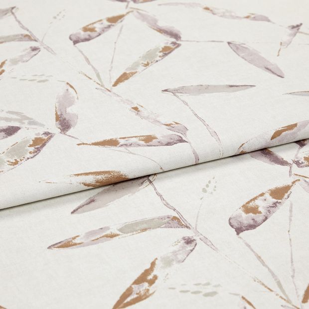 A folded piece of fabric with Aloha Blush Orange printed on it