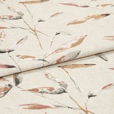 A folded piece of fabric with Aloha Sienna Orange printed on it