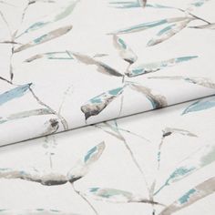 A folded piece of fabric with Aloha Turquoise Teal printed on it