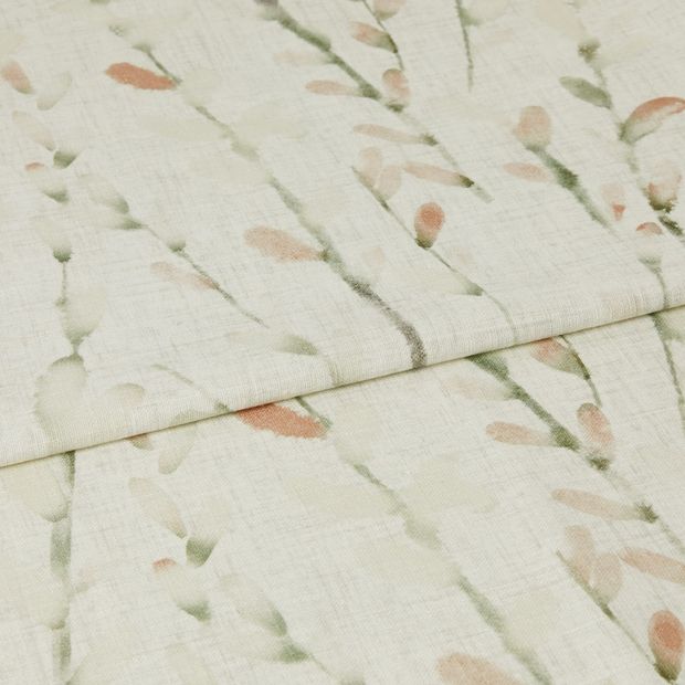 A folded piece of fabric with Amerlia Pomegranate Orange printed on it