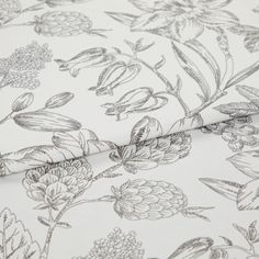 A folded piece of fabric with Anika Silver printed on it