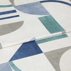 A folded piece of fabric with Block Ocean Blue printed on it
