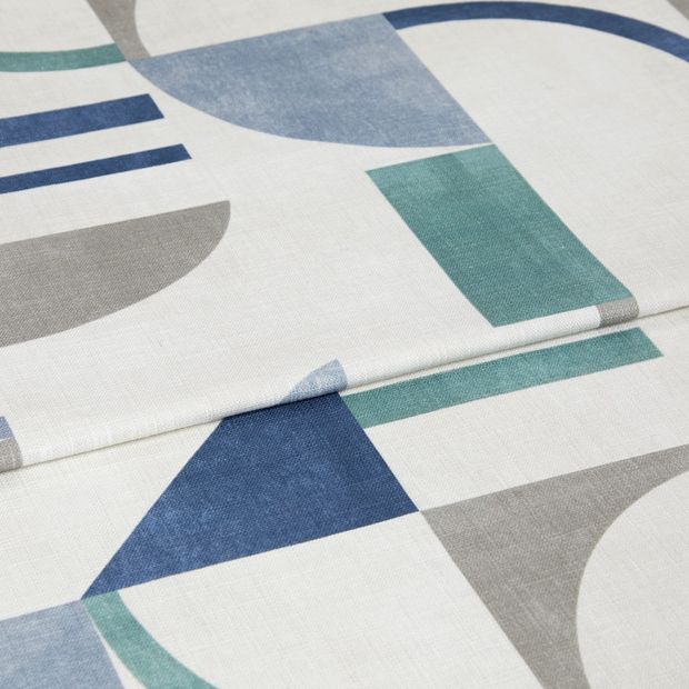 A folded piece of fabric with Block Ocean Blue printed on it