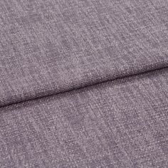 A folded piece of fabric with Boheme Plum Purple printed on it