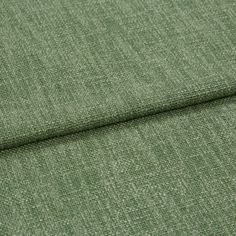A folded piece of fabric with Boheme Spruce Green printed on it