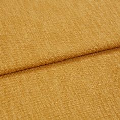 A folded piece of fabric with Boheme Sunflower Yellow printed on it