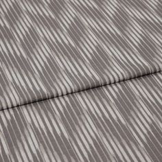 A folded piece of fabric with Diffuse Slate Grey printed on it