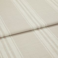 A folded piece of fabric with Duke Mink Beige printed on it