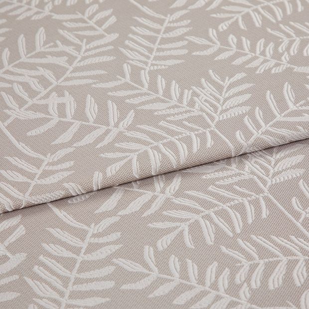 A folded piece of fabric with Fronds Natural Cream printed on it