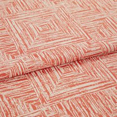 A folded piece of fabric with Gilmore Fiesta Red printed on it