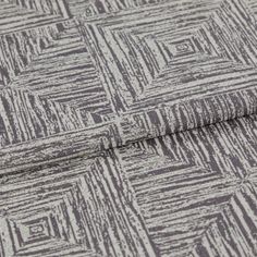 A folded piece of fabric with Gilmore Gray Ridge Blue printed on it