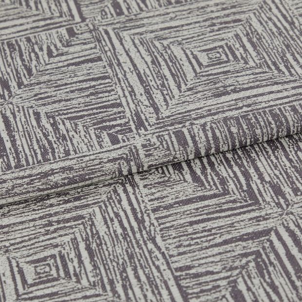 A folded piece of fabric with Gilmore Gray Ridge Blue printed on it