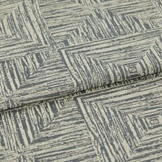 A folded piece of fabric with Gilmore Steel Blue  printed on it