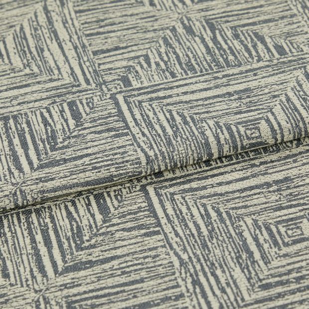 A folded piece of fabric with Gilmore Steel Blue  printed on it