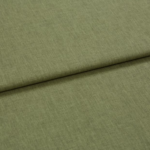 A folded piece of fabric with Harper Dill Green printed on it